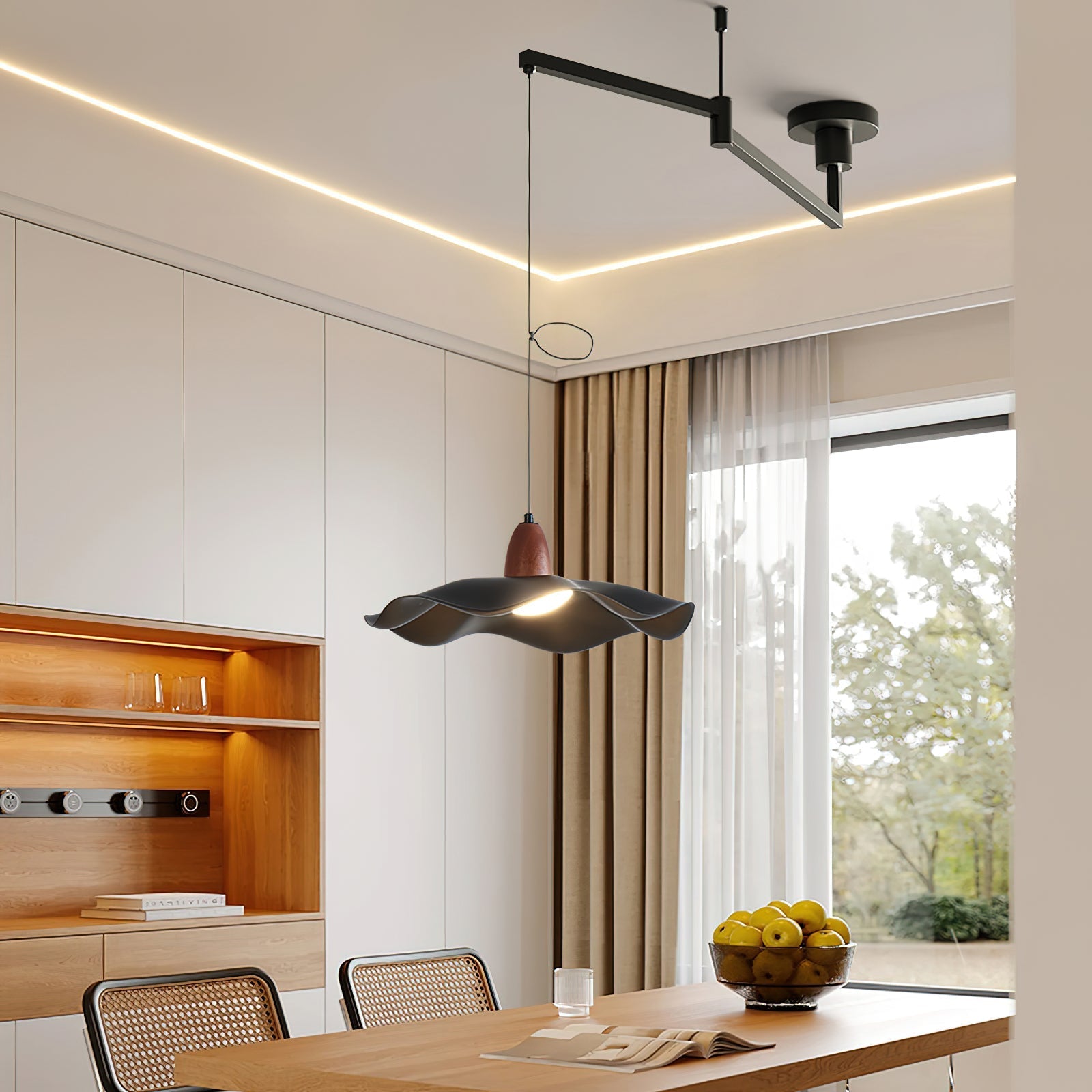 Close-up of the sculptural wavy shade on the swing arm pendant.