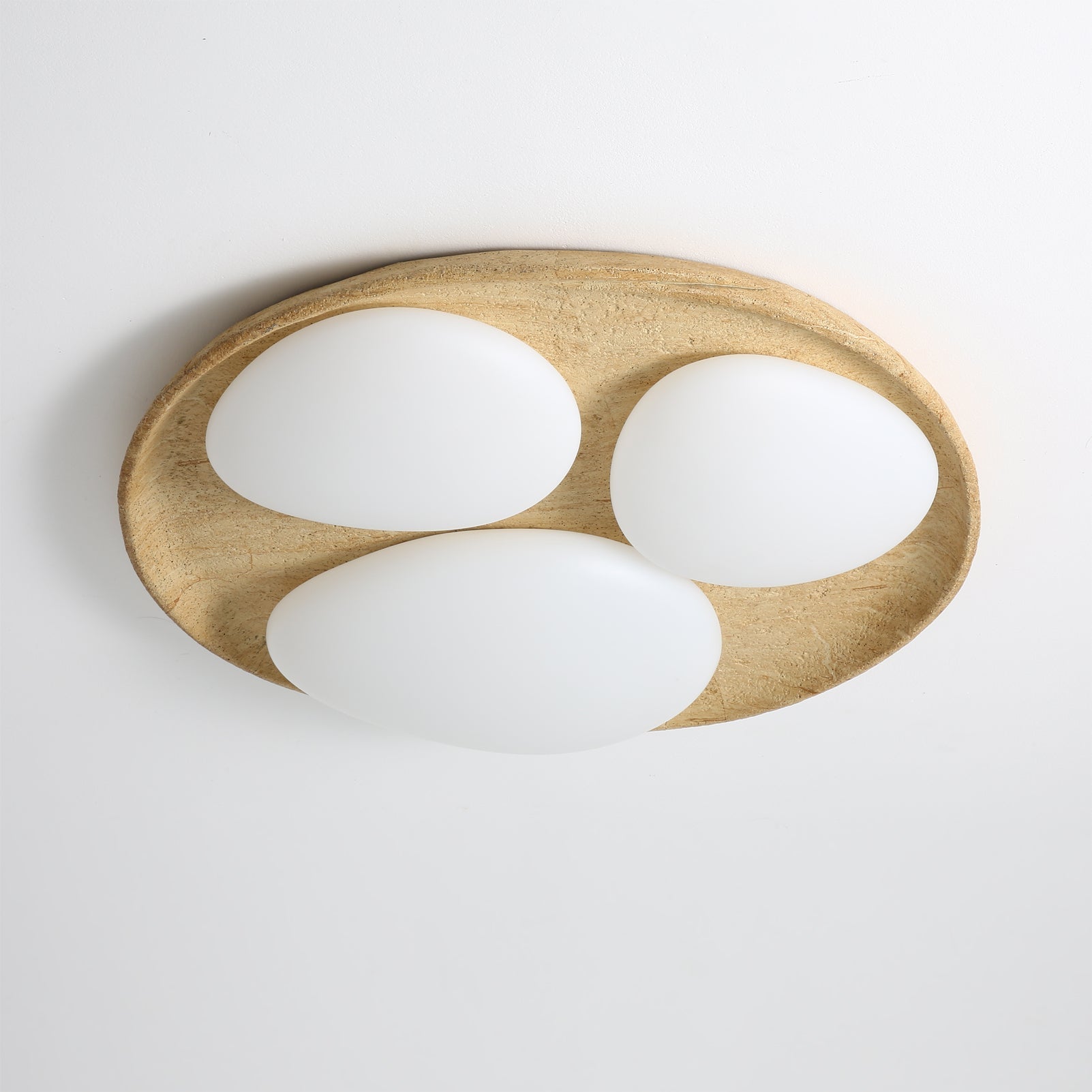 Lifestyle image of the Topo Ceiling Light in a bedroom.