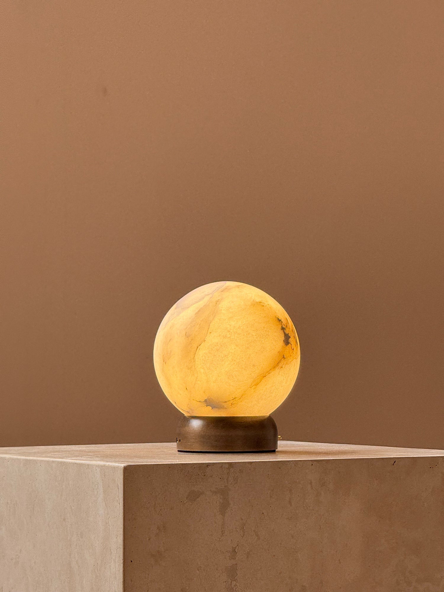 The lamp's base, showing the charging port detail.