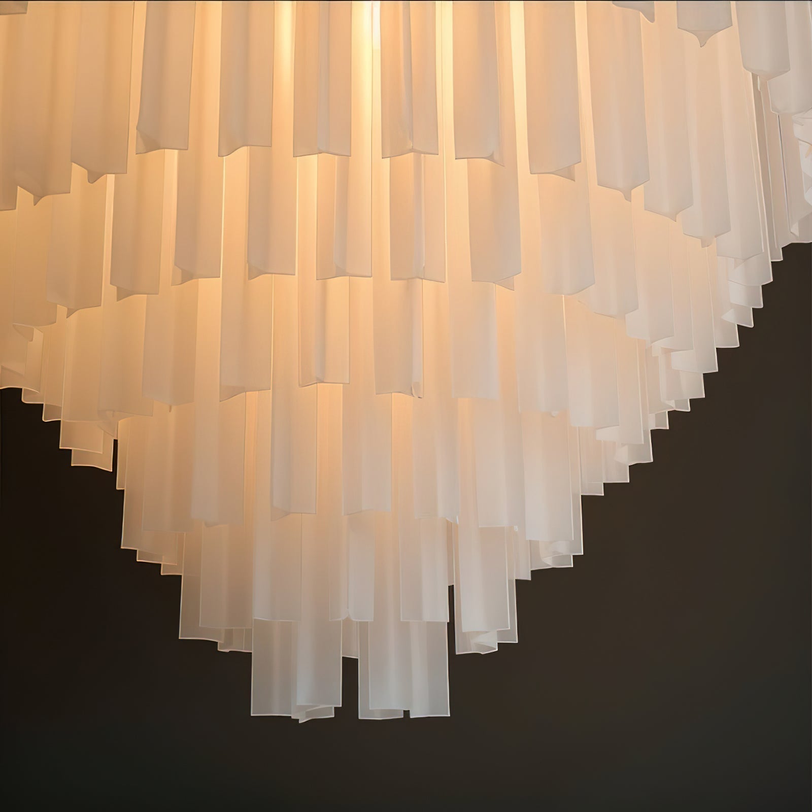 Angled shot of the chandelier highlighting its upward-blooming design.