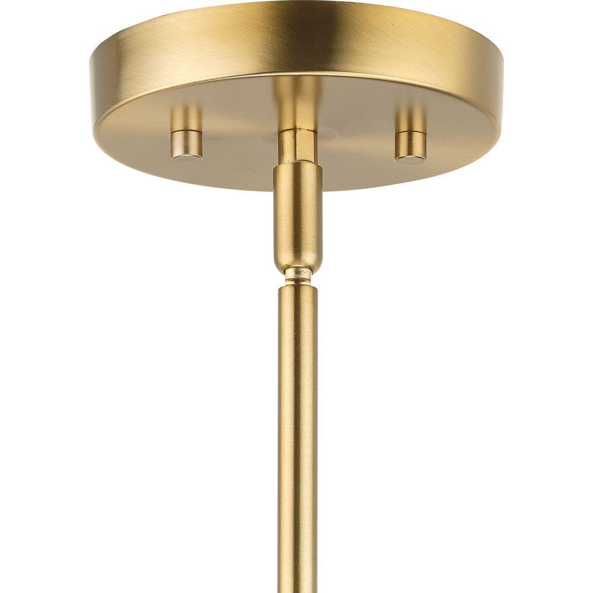 The lamp against a plain background, brass color.