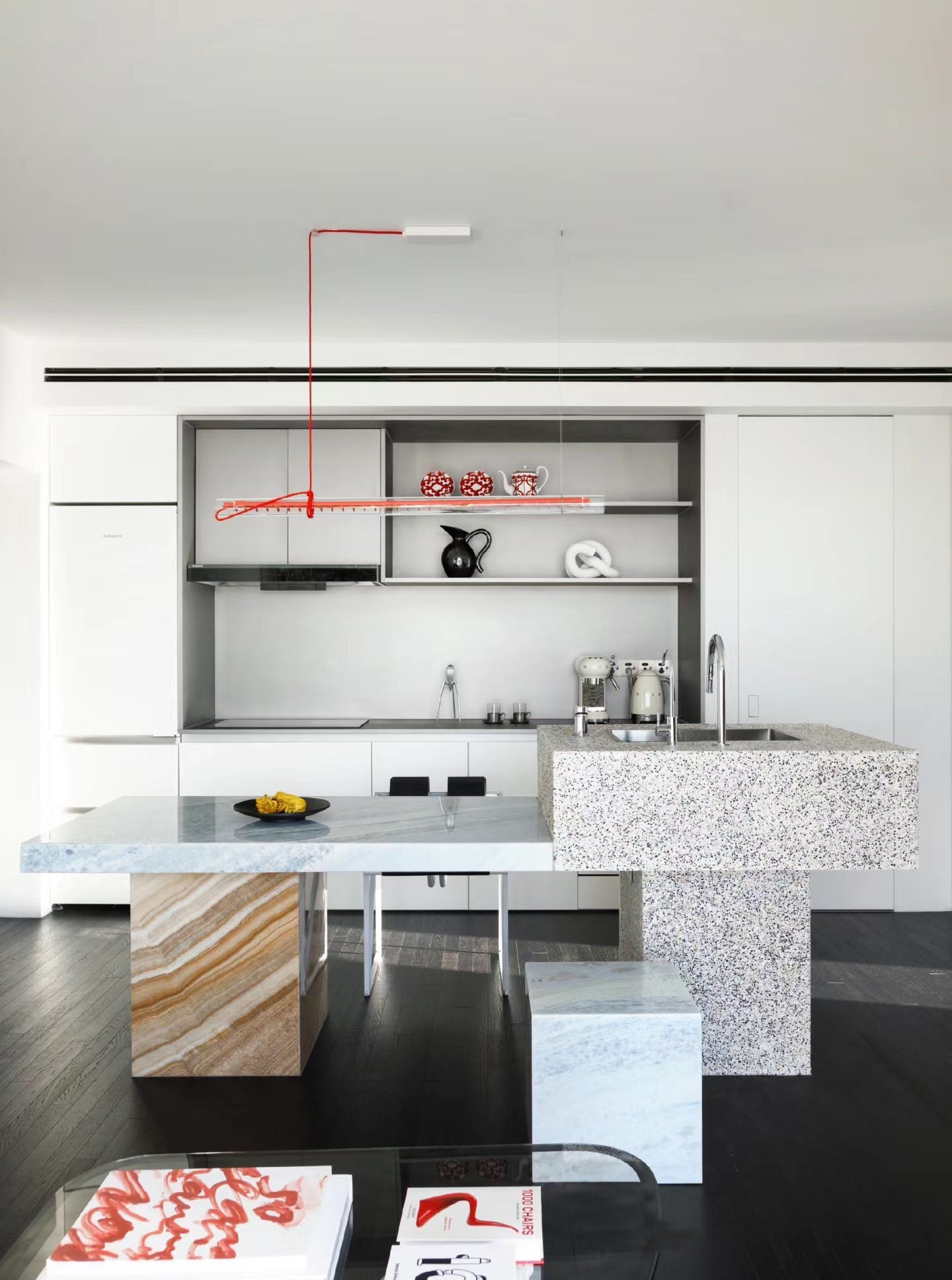 Side view of the long linear pendant lamp, highlighting its sleek profile.