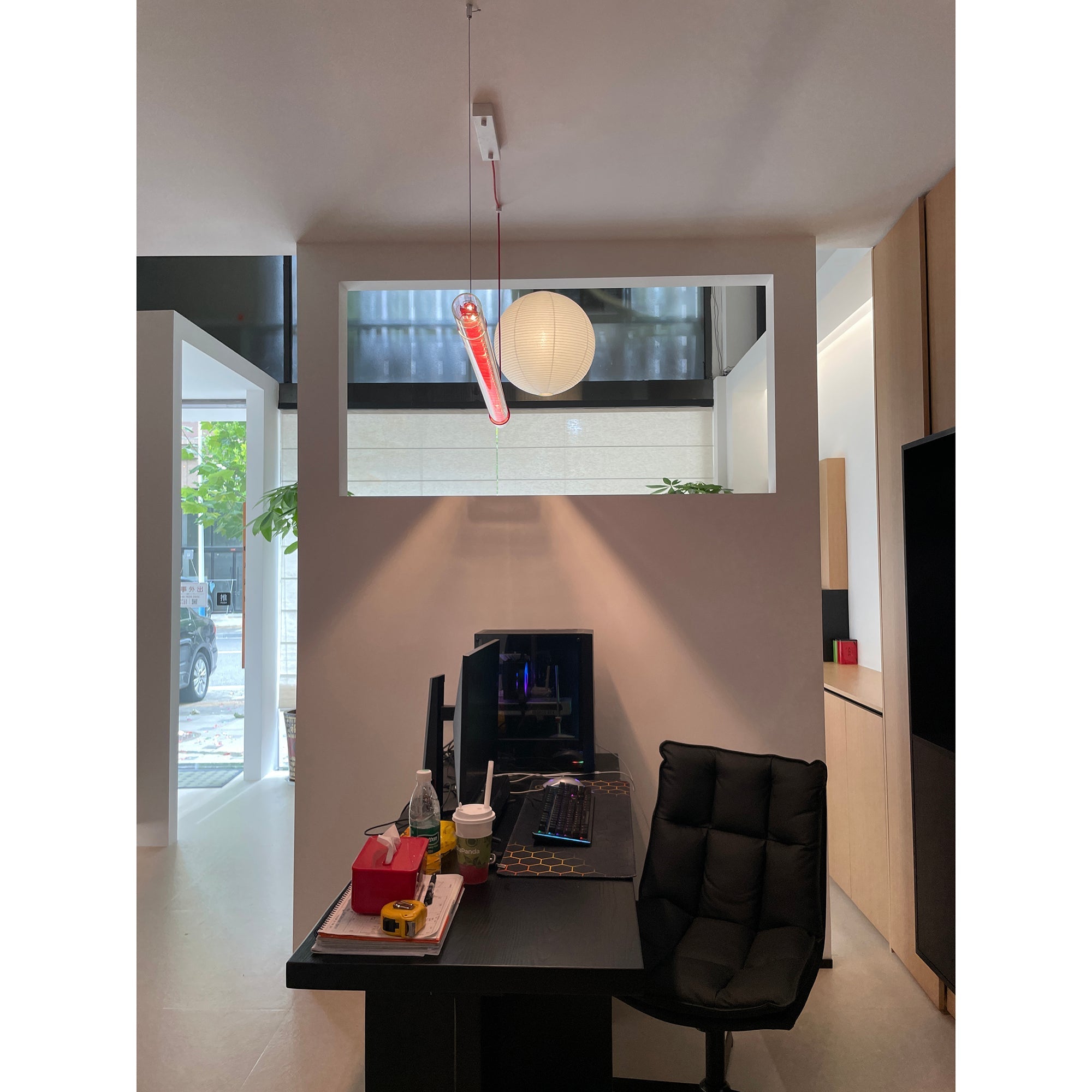 The 180cm version of the pendant lamp over a large dining table.