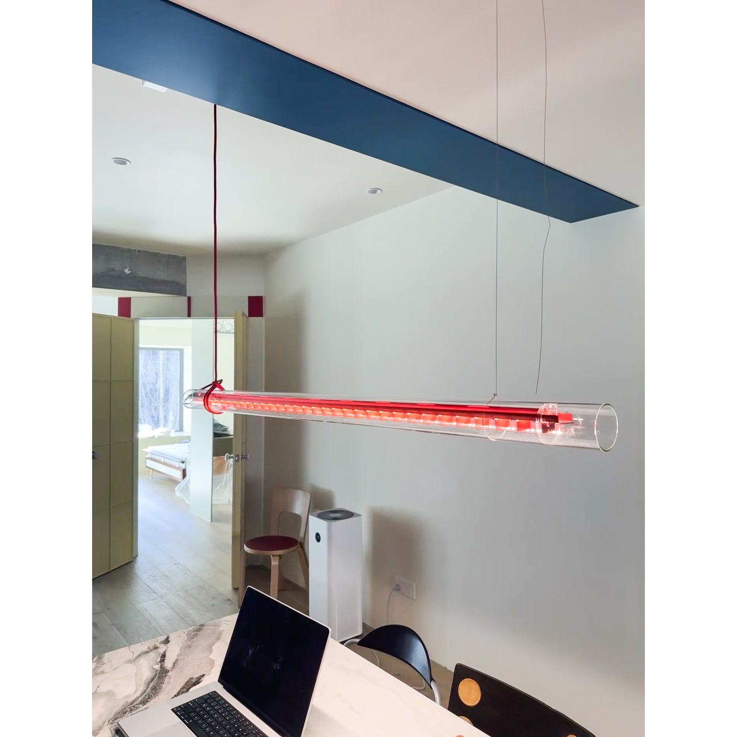 Lifestyle image of the lamp in a contemporary home office.