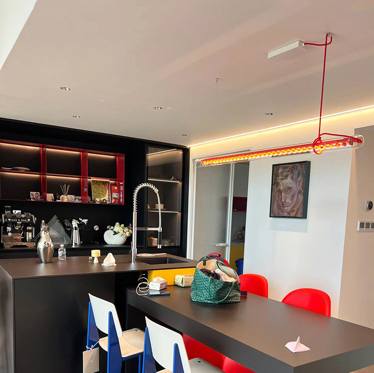 The pendant lamp shown in a contemporary dining room setting.