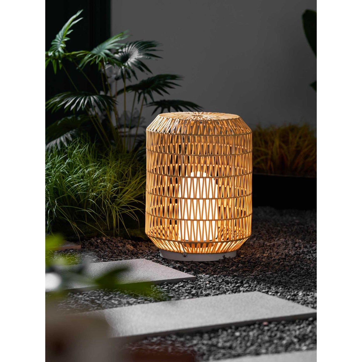 Angled view of the large Tulum Lantern in natural rattan.