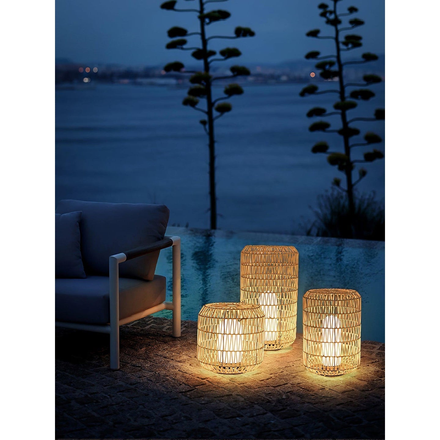 Angled view of the medium Tulum Lantern in white.