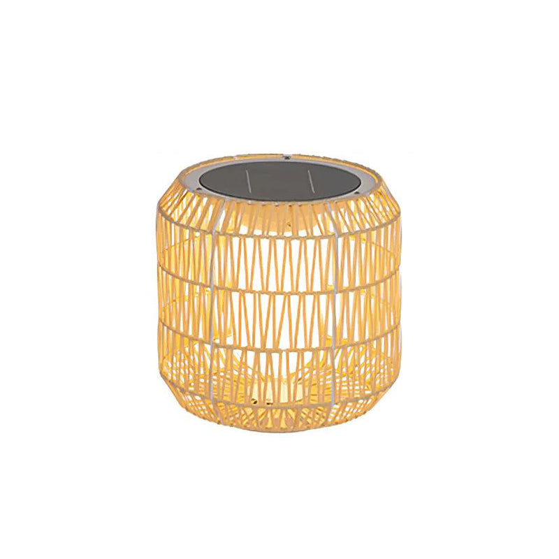 Natural Rattan Tulum Lantern adding warmth to a cool-toned patio.