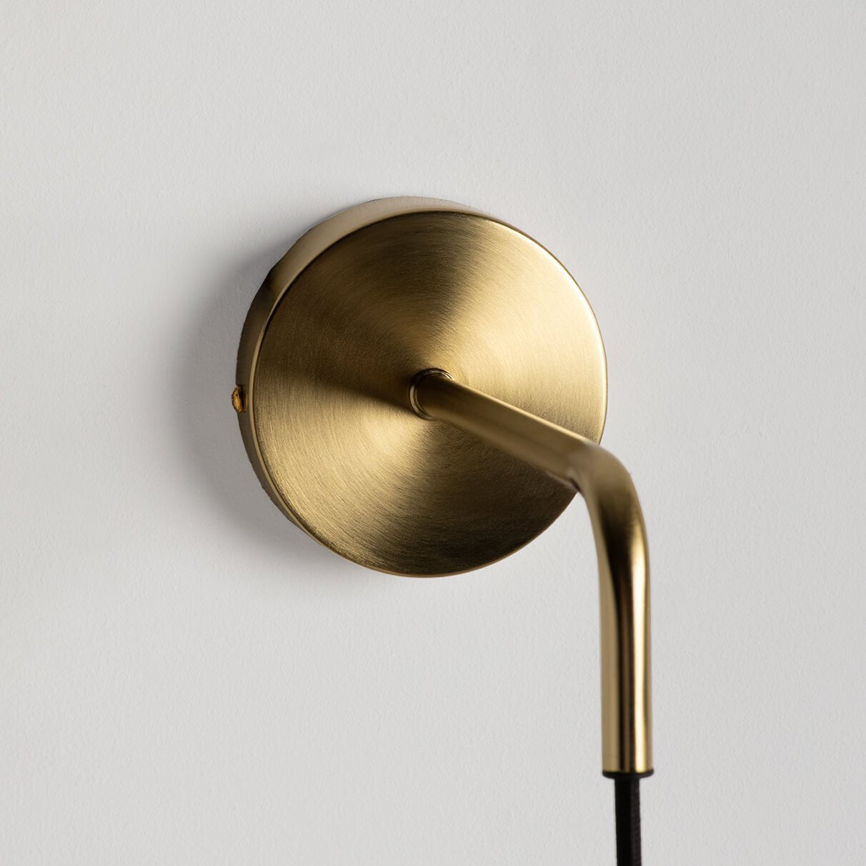 Front view of the Valenes Wall Lamp against a neutral wall.