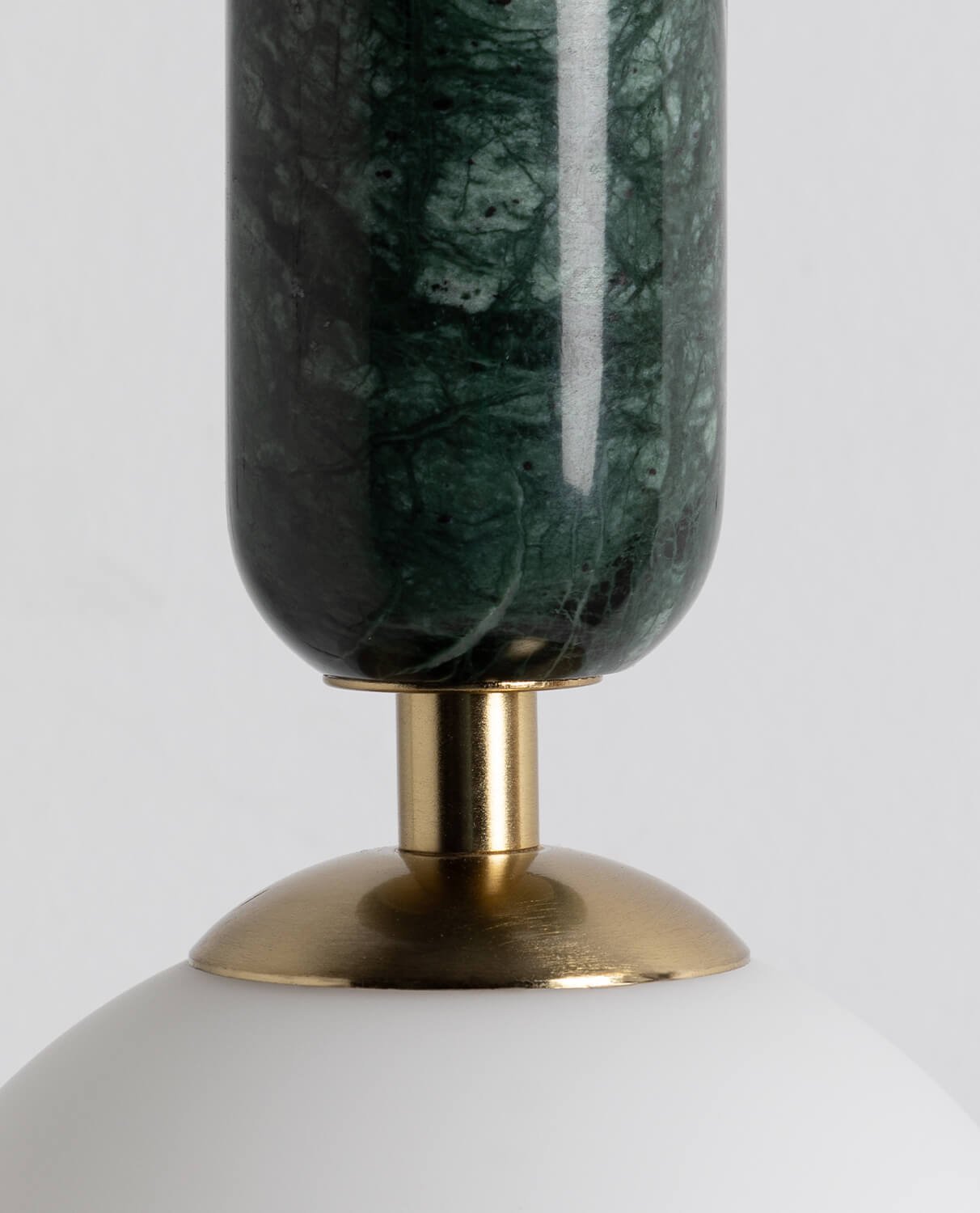 The three available finishes: Green, White, and Gold, shown side-by-side.