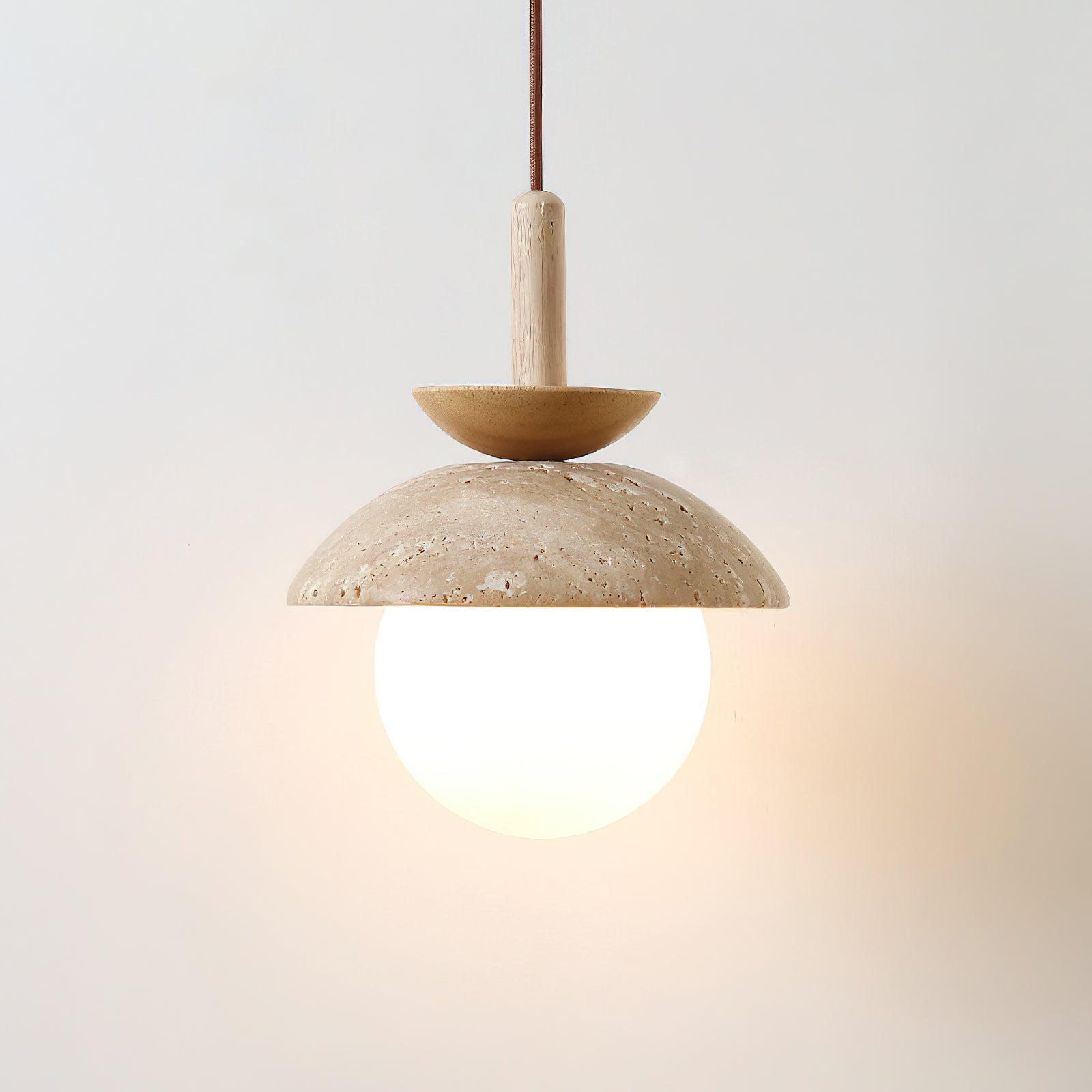 The 1-light Valerie Pendant Light hanging in a modern room.