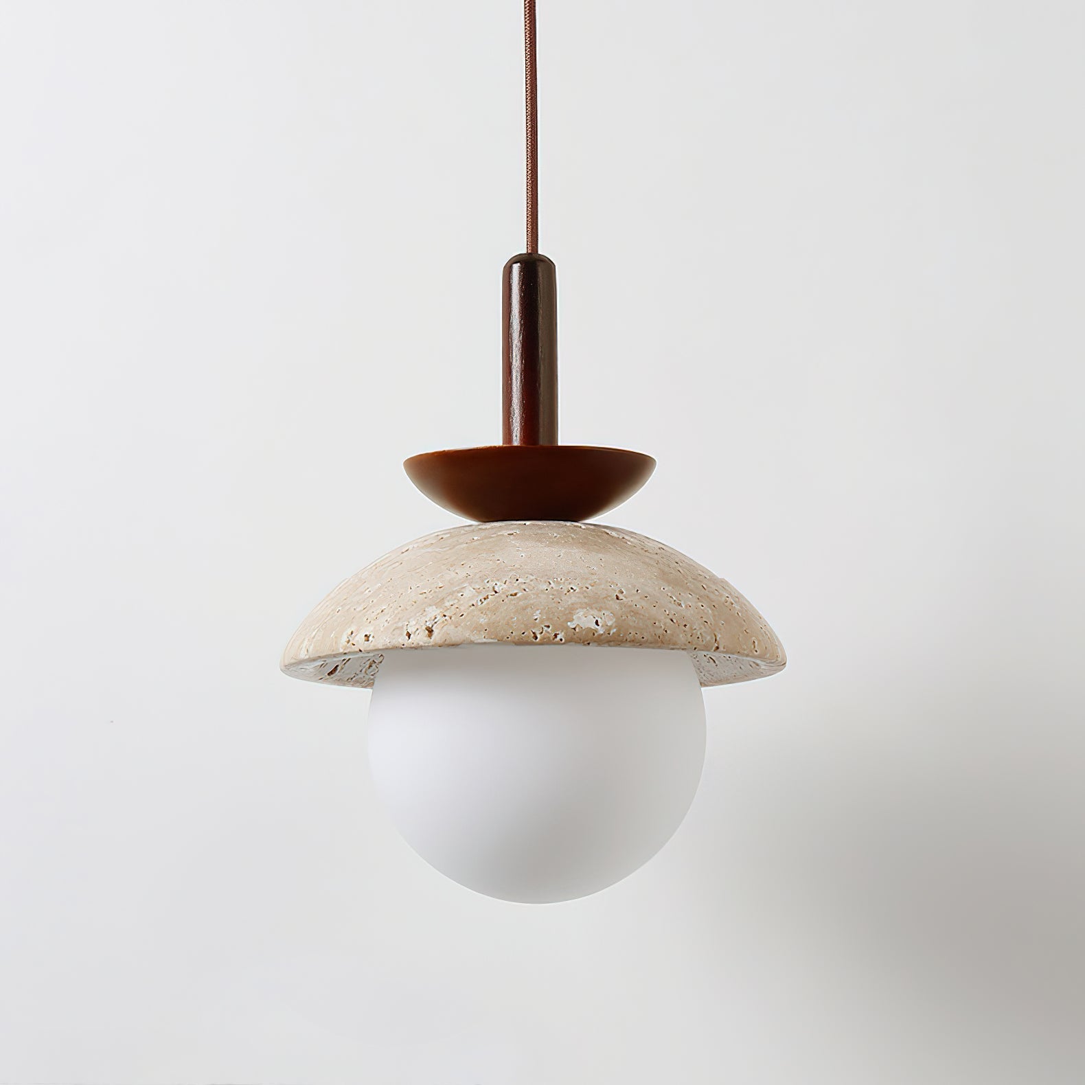 Lifestyle view of the Valerie Pendant Light in a bedroom nook.