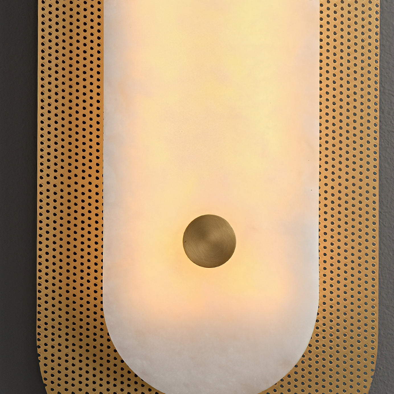 Side view of the Vance Alabaster Wall Lamp mounted on a wall.