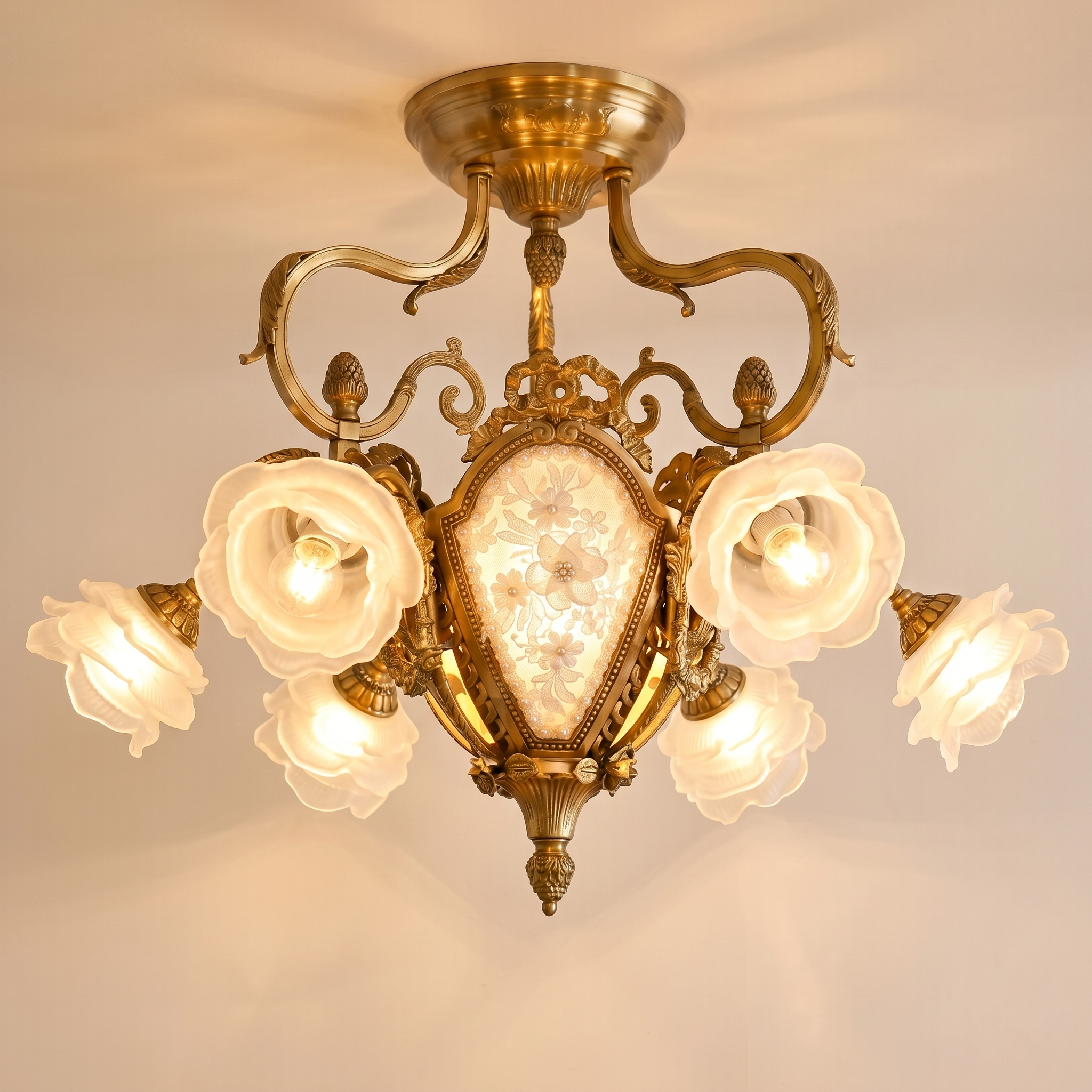The light fixture unlit, showcasing the polished brass finish and glass details.