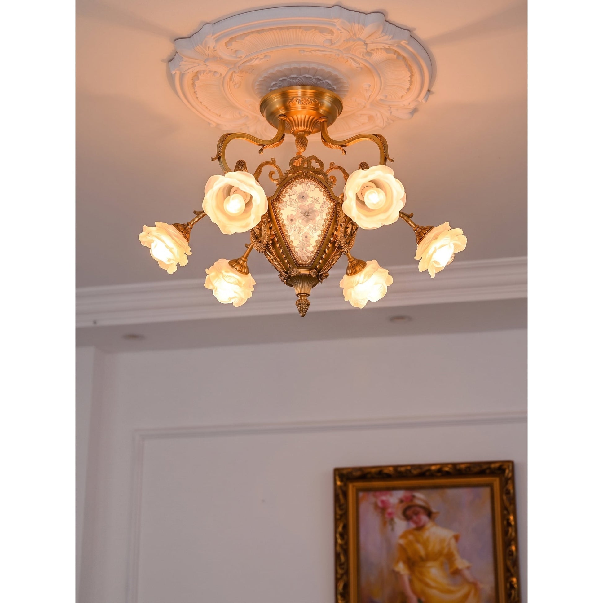 The polished brass canopy and mounting hardware for the semi-flush mount.
