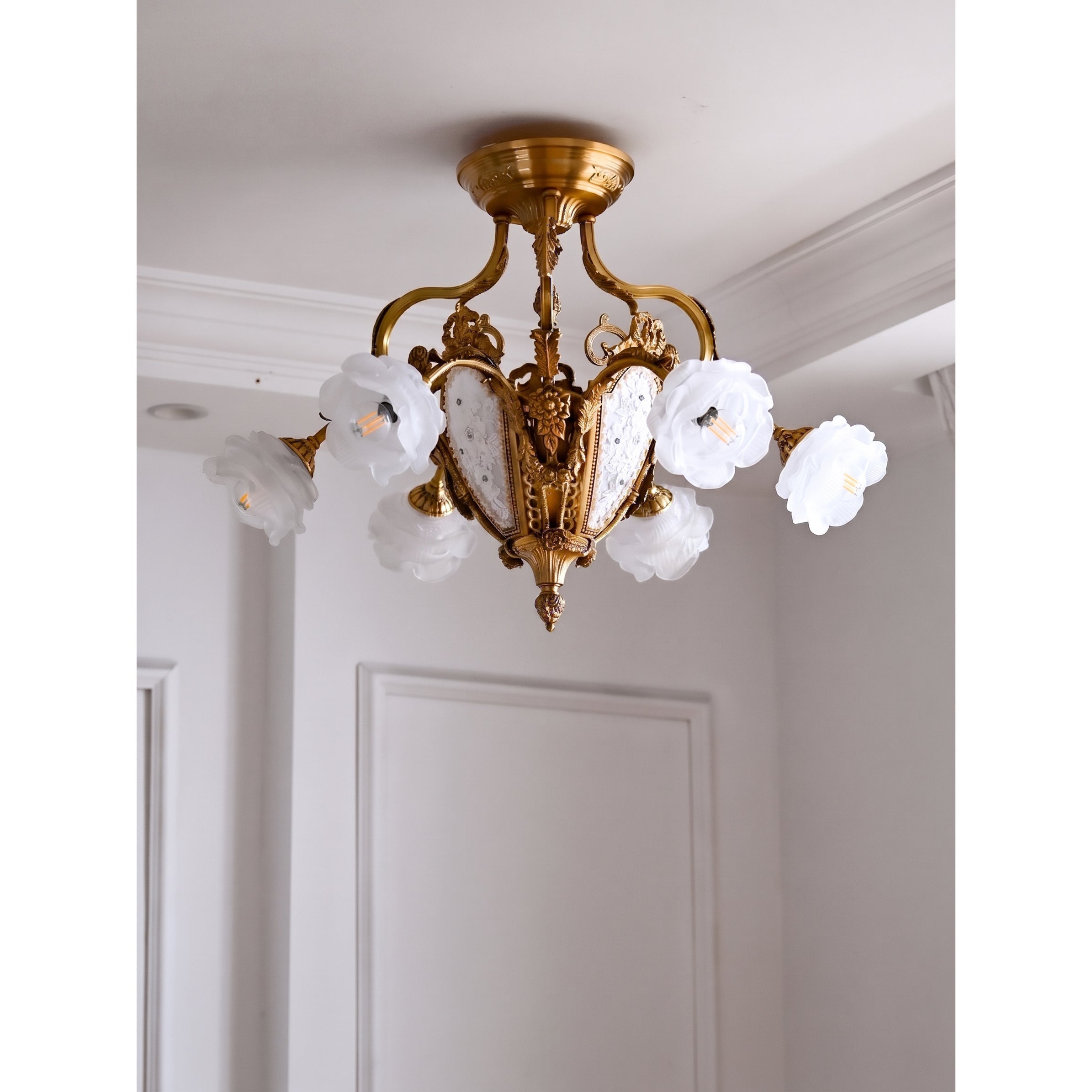 View from below of the semi-flush mount, showing all seven light sources.