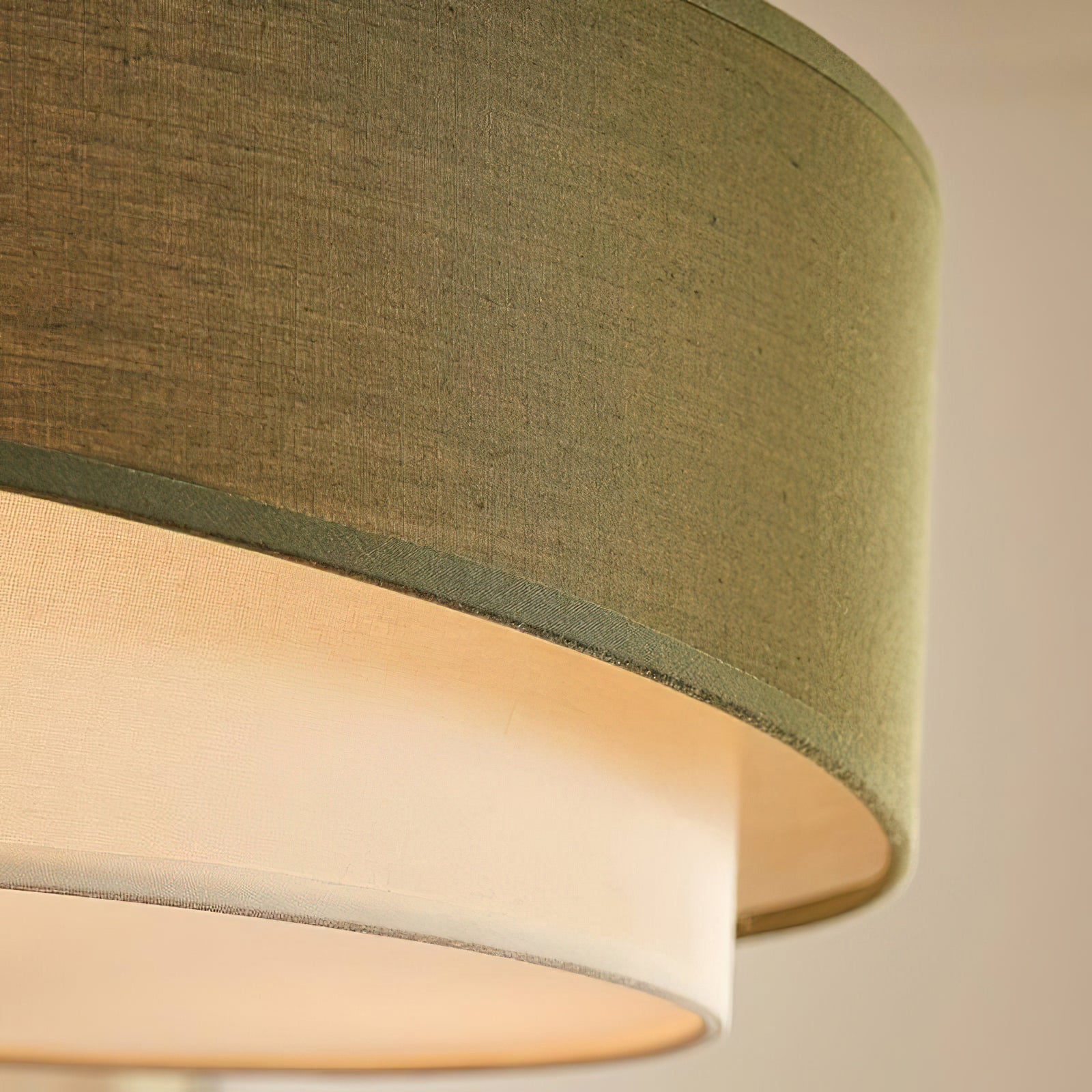 Vanelia Ceiling Lamp illuminated, highlighting the cream inner diffuser.