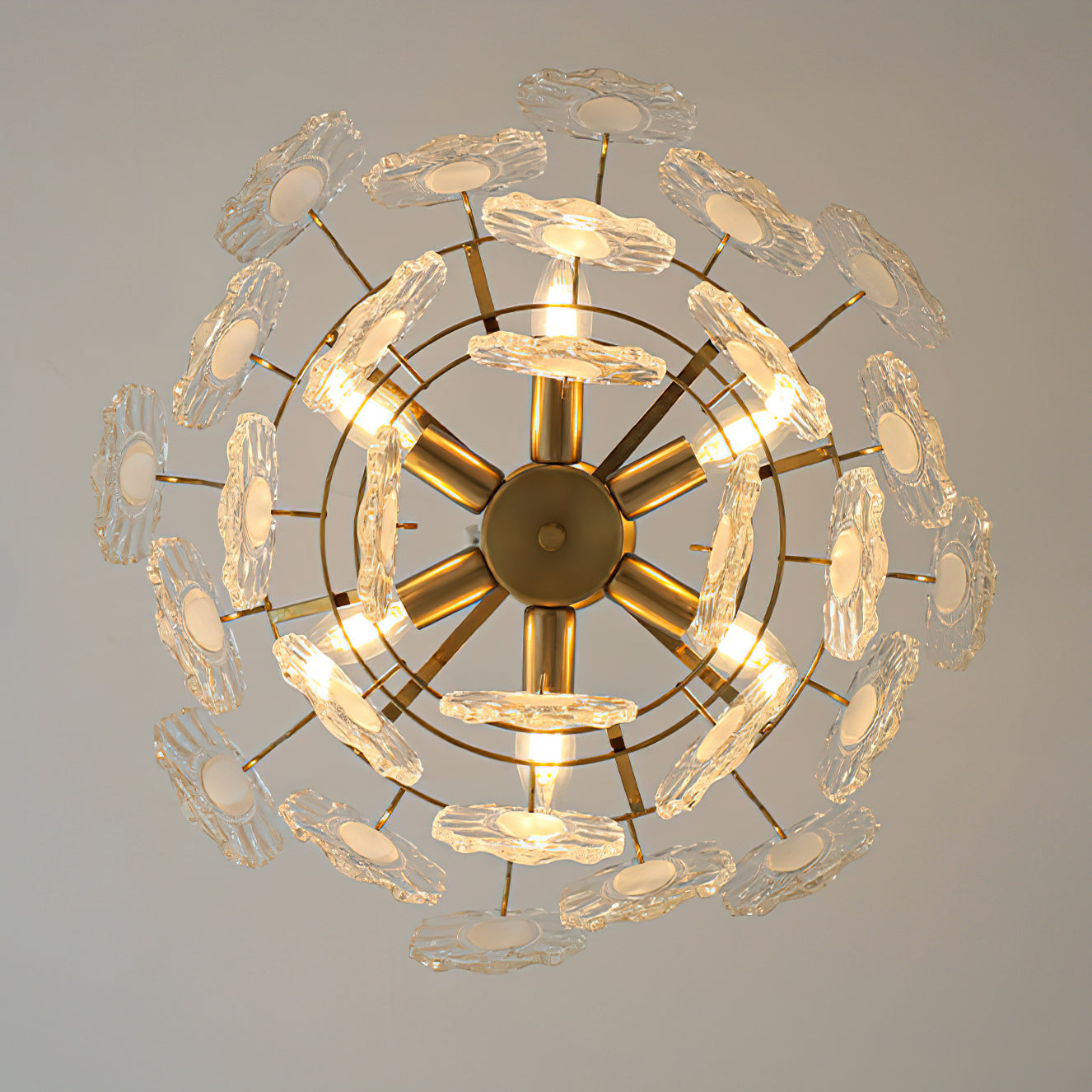 The layered effect of the scalloped glass panels on the Varvara Chandelier.