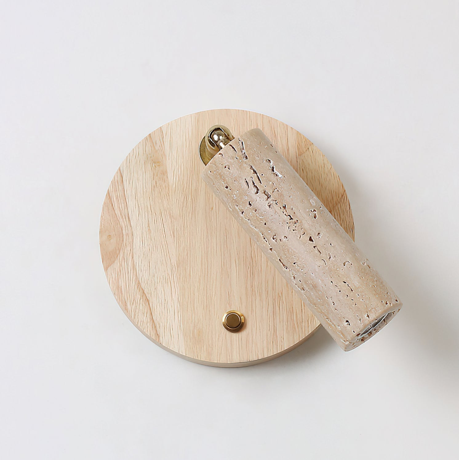 Angled view showcasing the swivel joint connecting the shade and backplate.