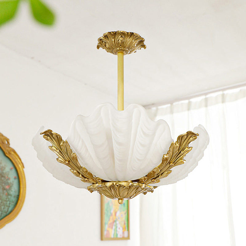 Close-up of the lamp's mounting plate in antiqued brass.