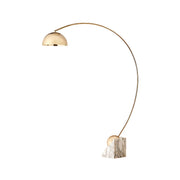 Venus Marble Floor Lamp with gold finish in a living room setting.