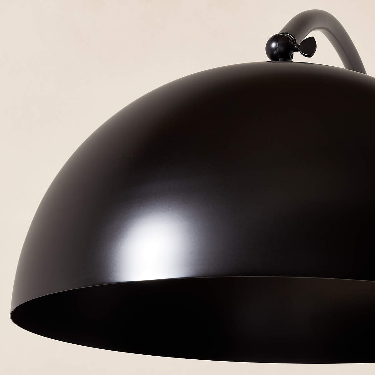 The Venus Floor Lamp in a bedroom corner, creating a cozy ambiance.