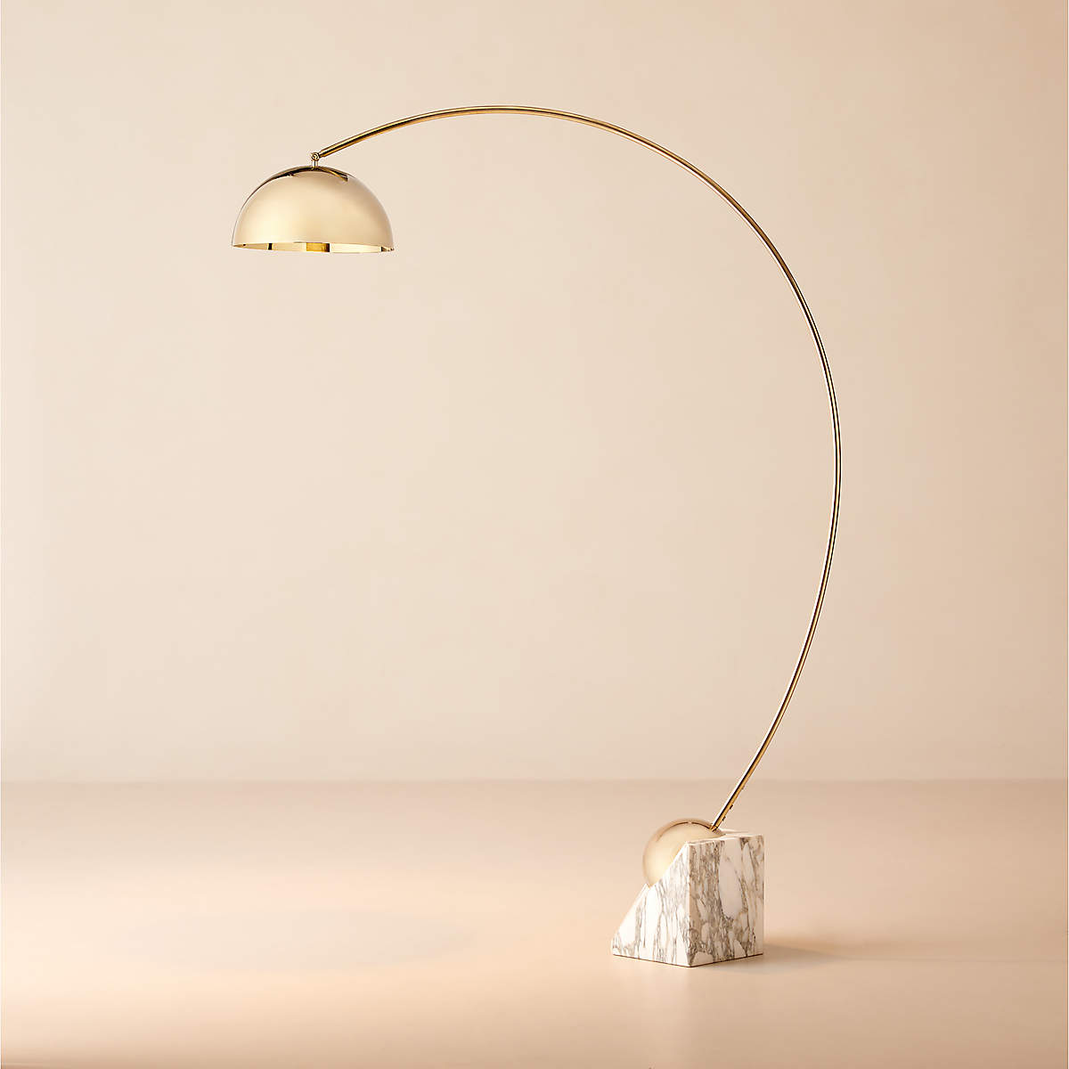 The matte black version of the Venus Floor Lamp in a contemporary room.