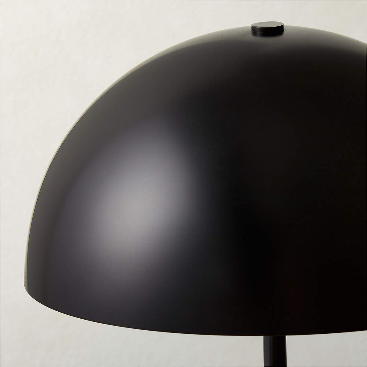 Comparison shot of the white, black, and gold finishes of the Venus Table Lamp.