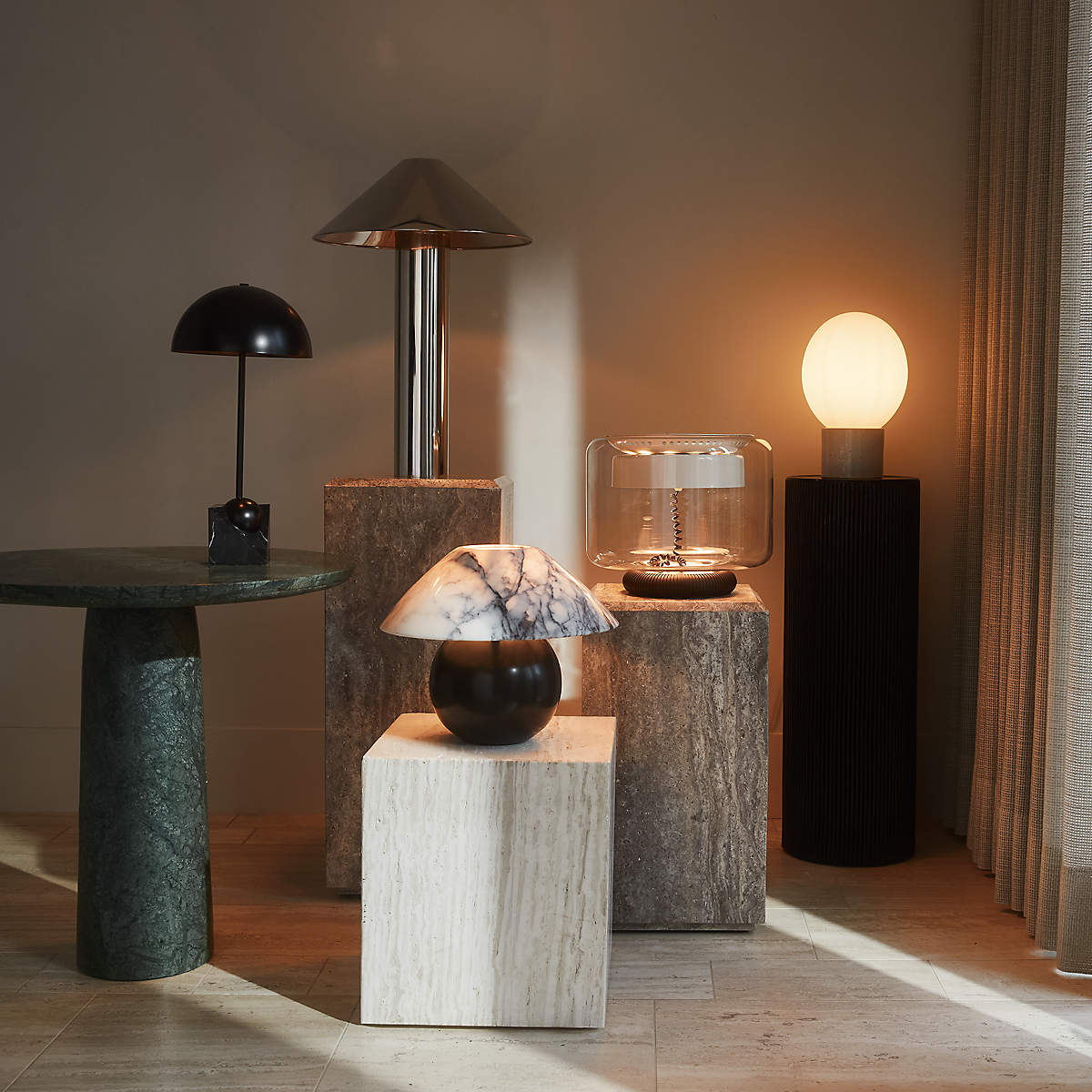 The gold Venus Table Lamp shown from a side angle.