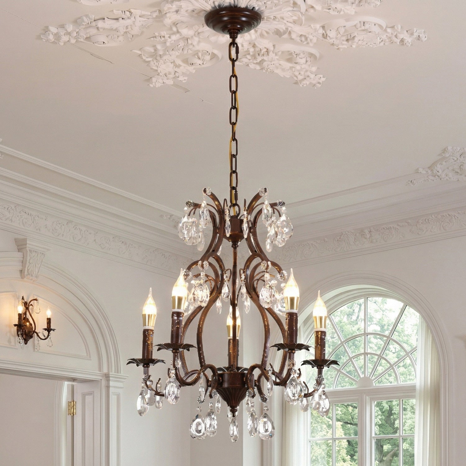 Top-down view showing the chandelier's crystal arrangement and metal frame.