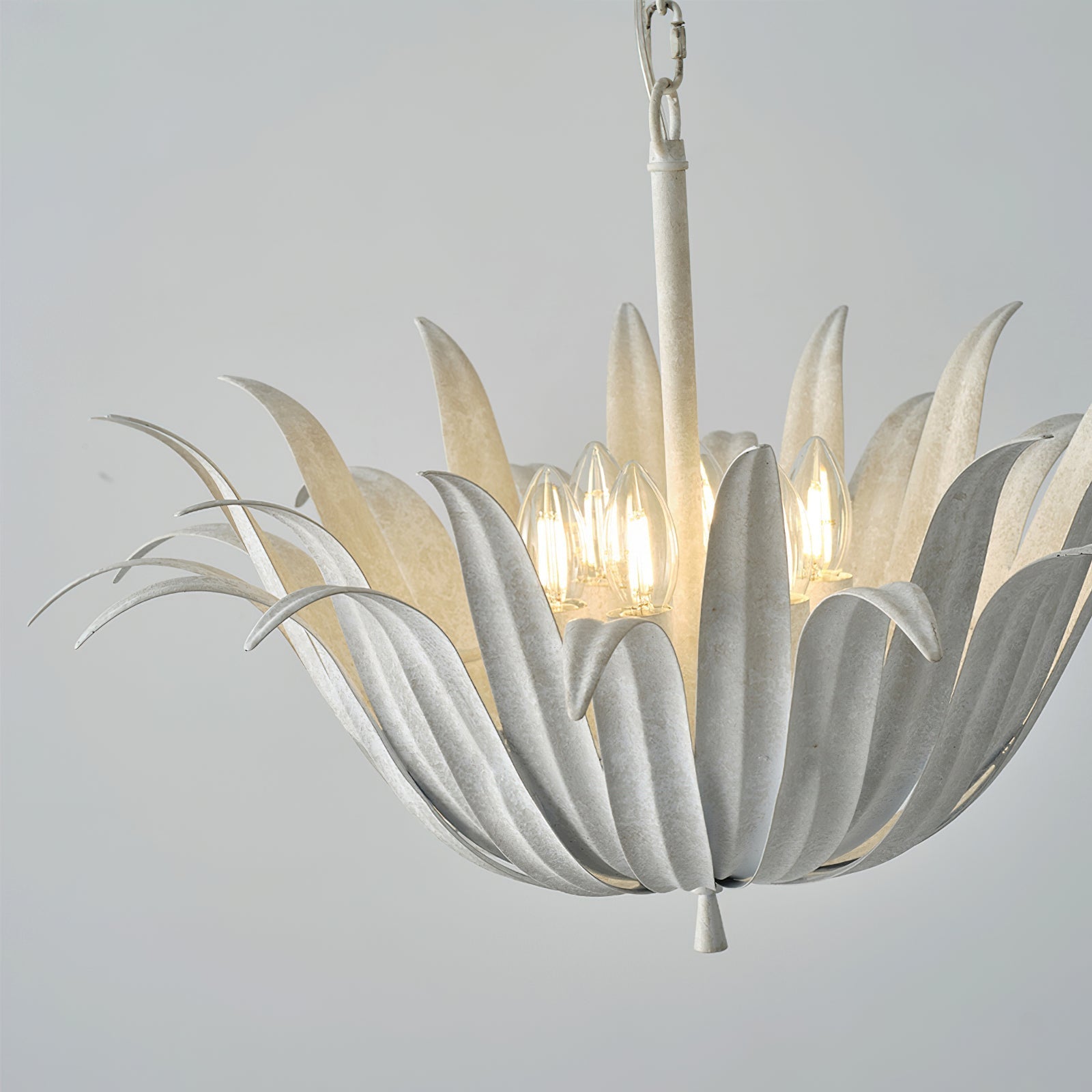 Unlit view of the white pendant against a light background.