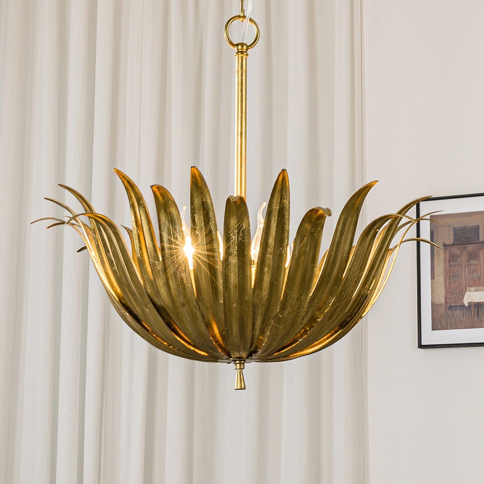 The blooming chalice silhouette of the Vicenzio pendant light.