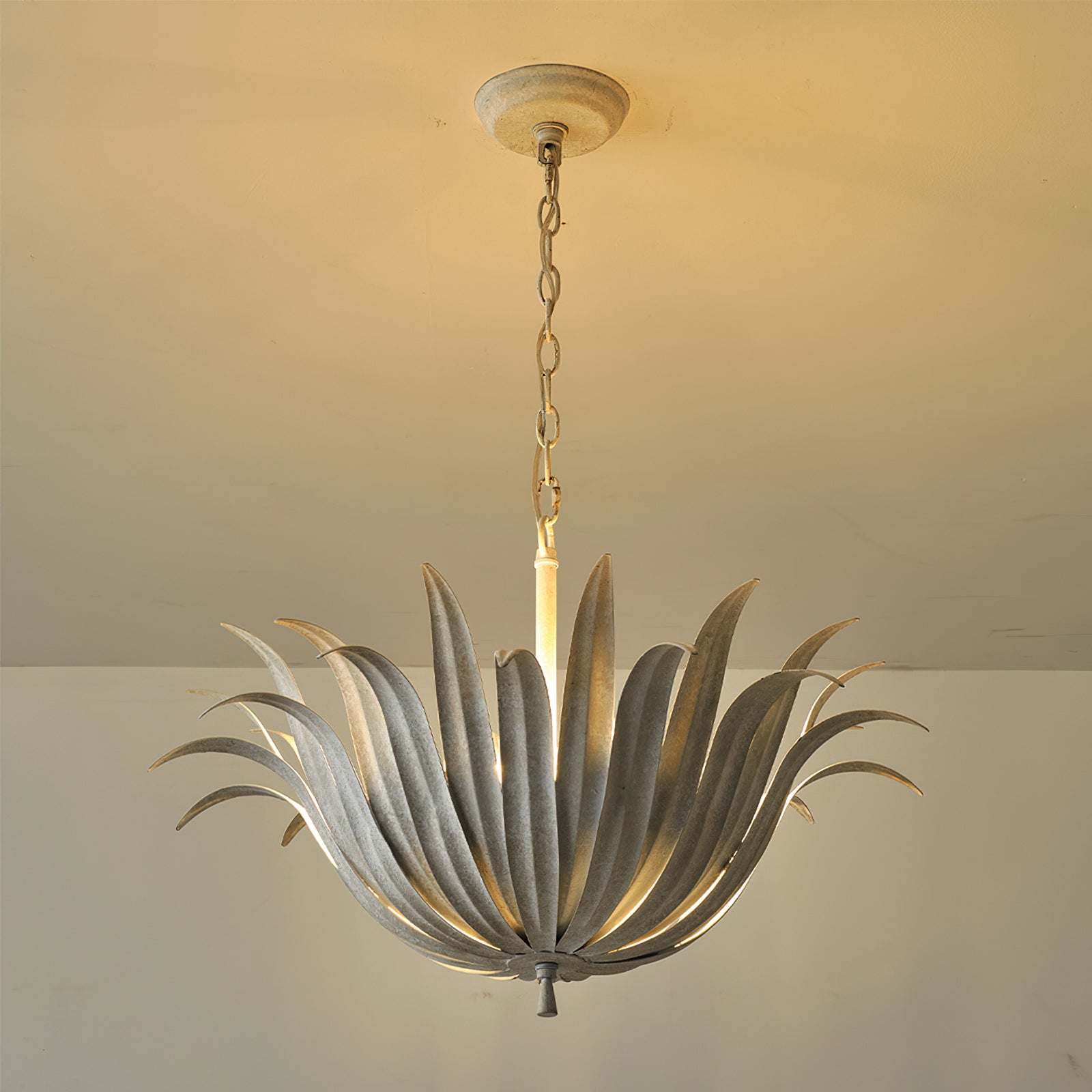Lifestyle image showing the pendant's scale in a high-ceiling room.