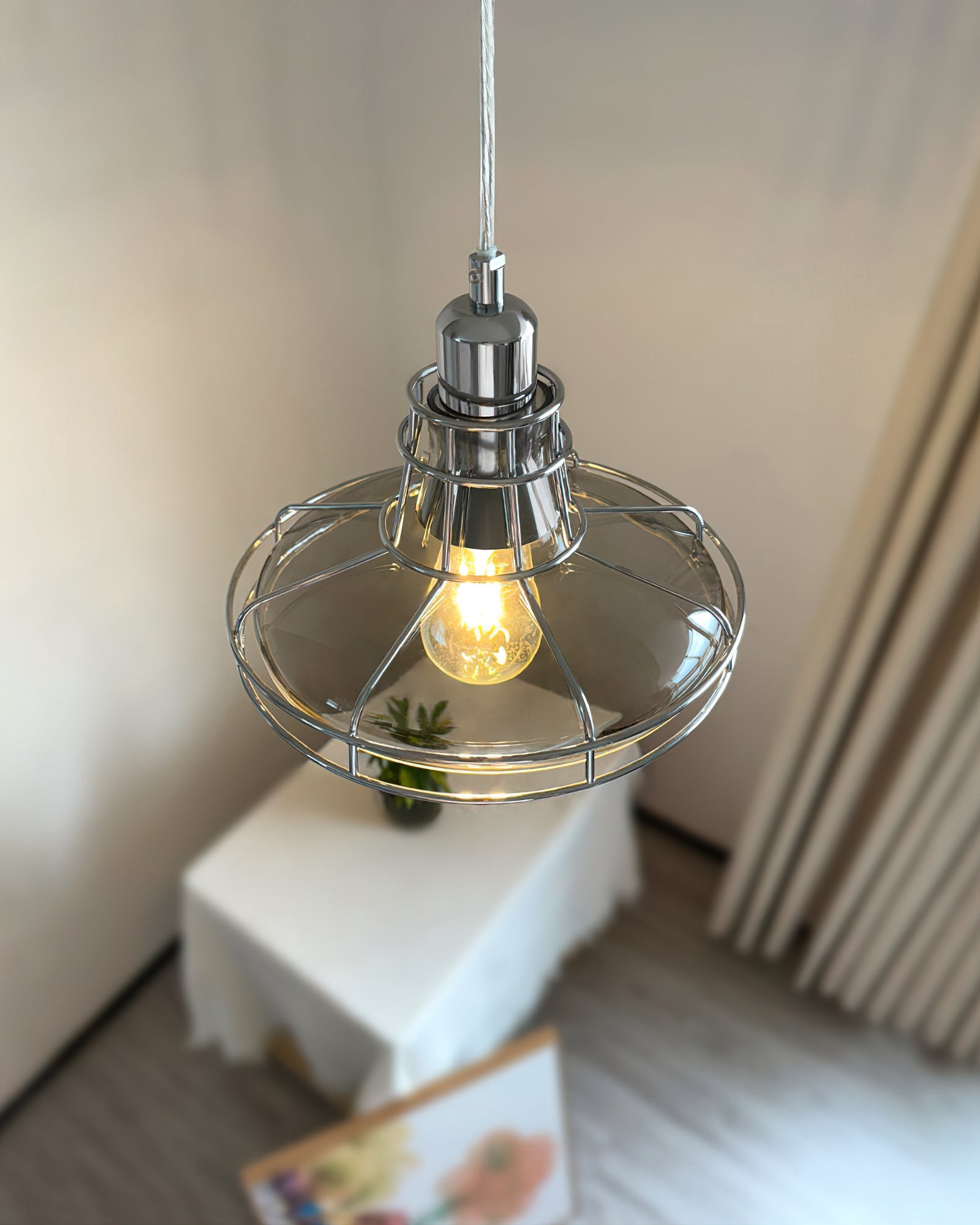 Williston Pendant Light hanging over a kitchen island.