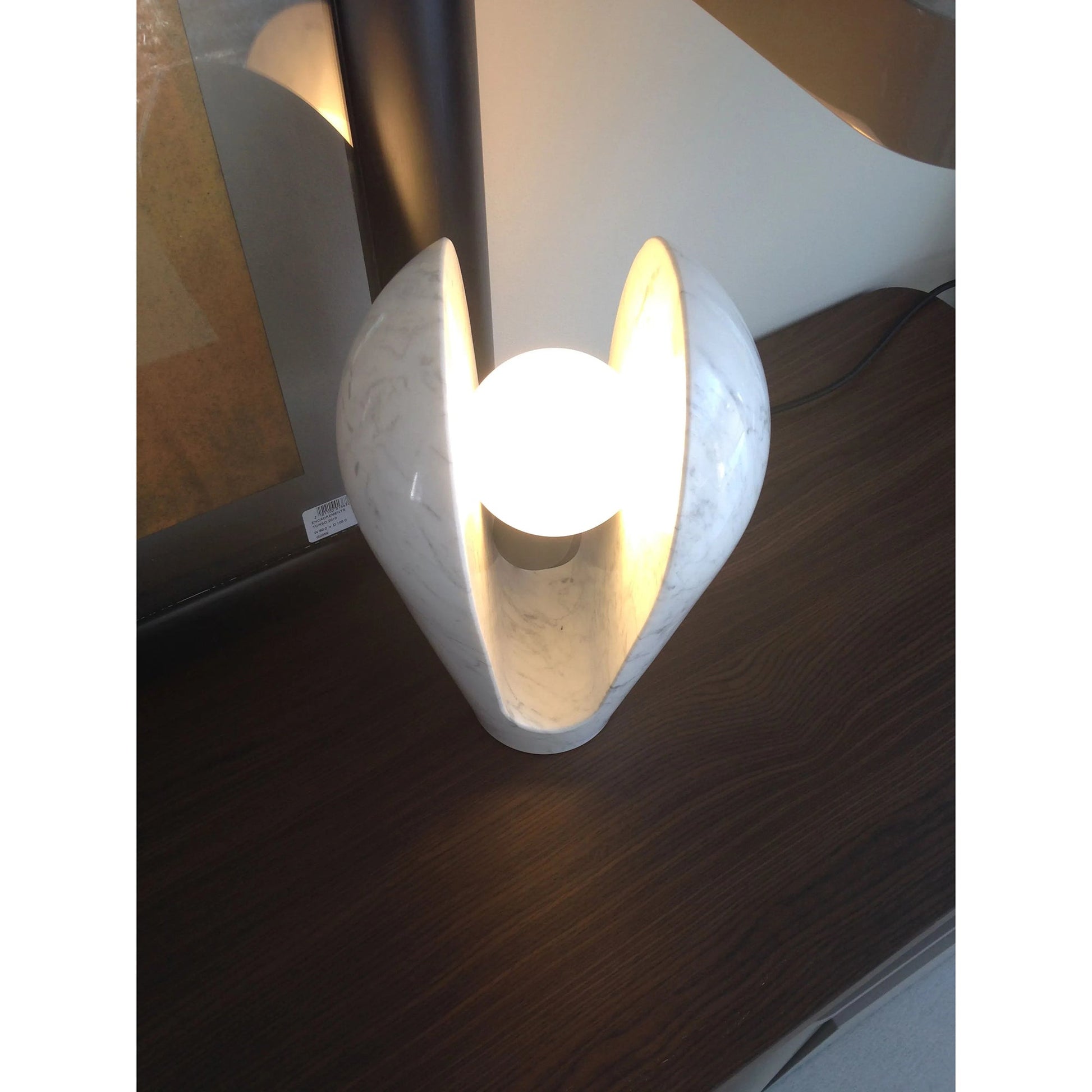Side profile of the sculptural Victoire Marble Table Lamp.