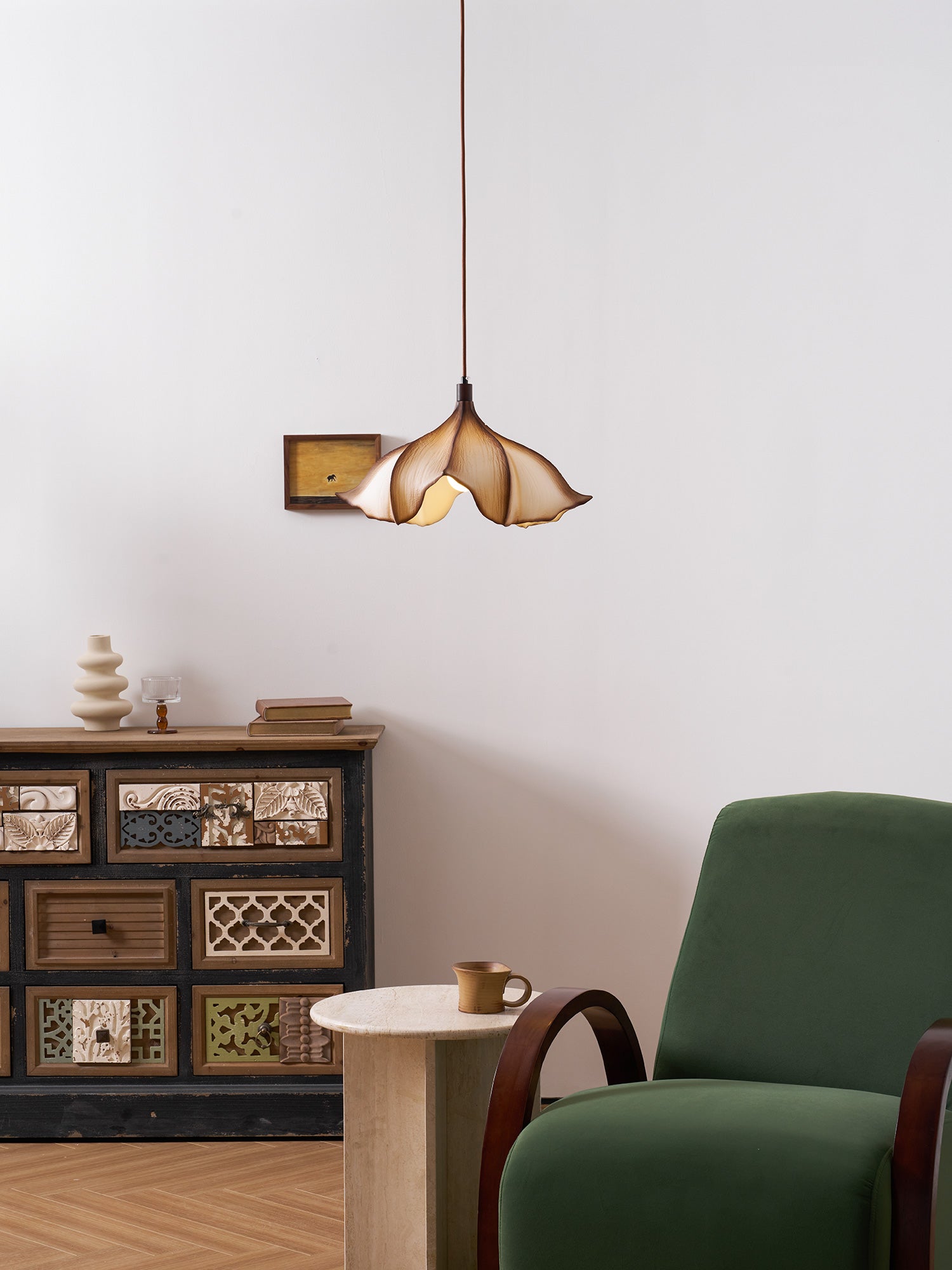 The Viscontea Pendant Light as a focal point in a high-ceiling room.