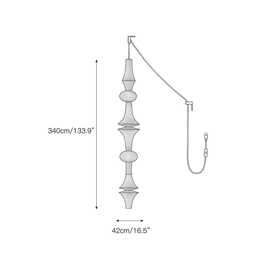 Lifestyle image of the pendant swag light over a dining table.