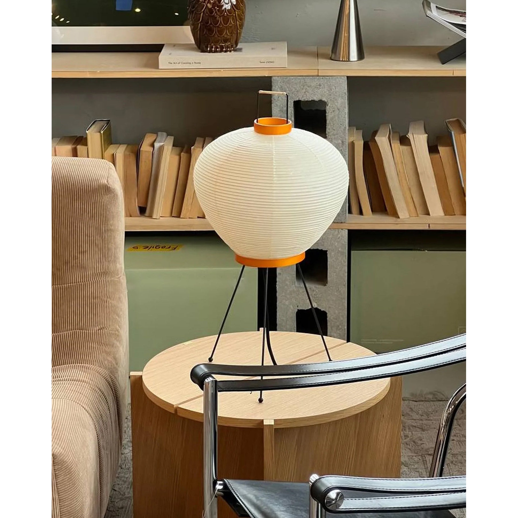 The lamp displayed on a side table next to a sofa.