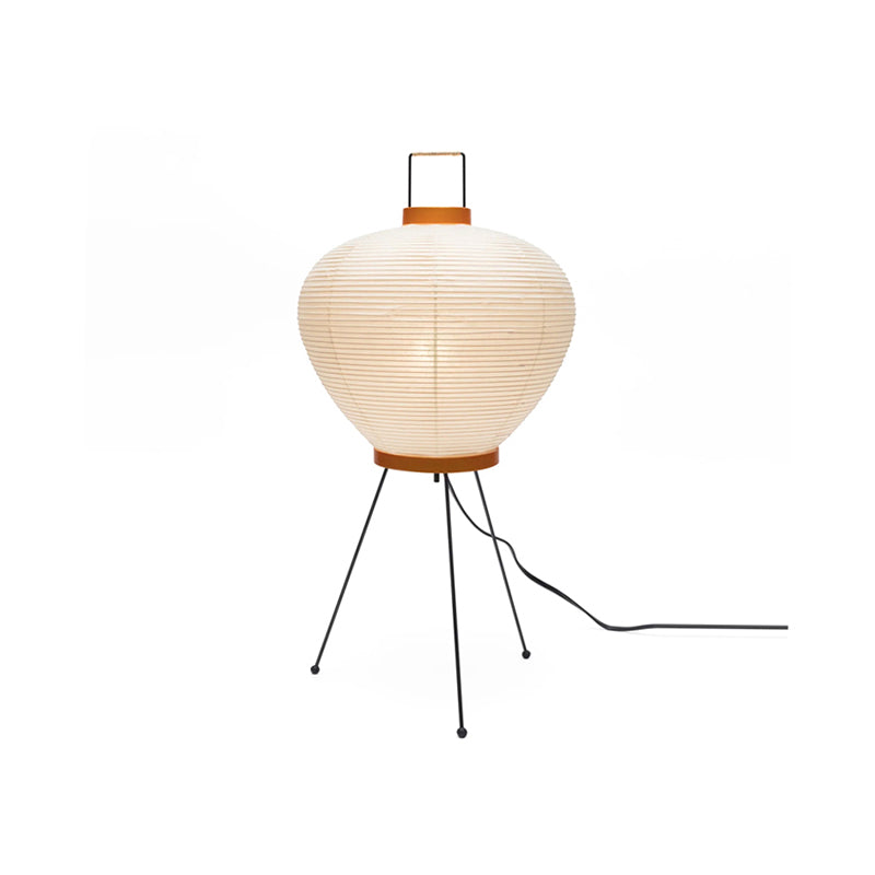Lifestyle image of the Washi 3A Table Lamp in a bedroom.