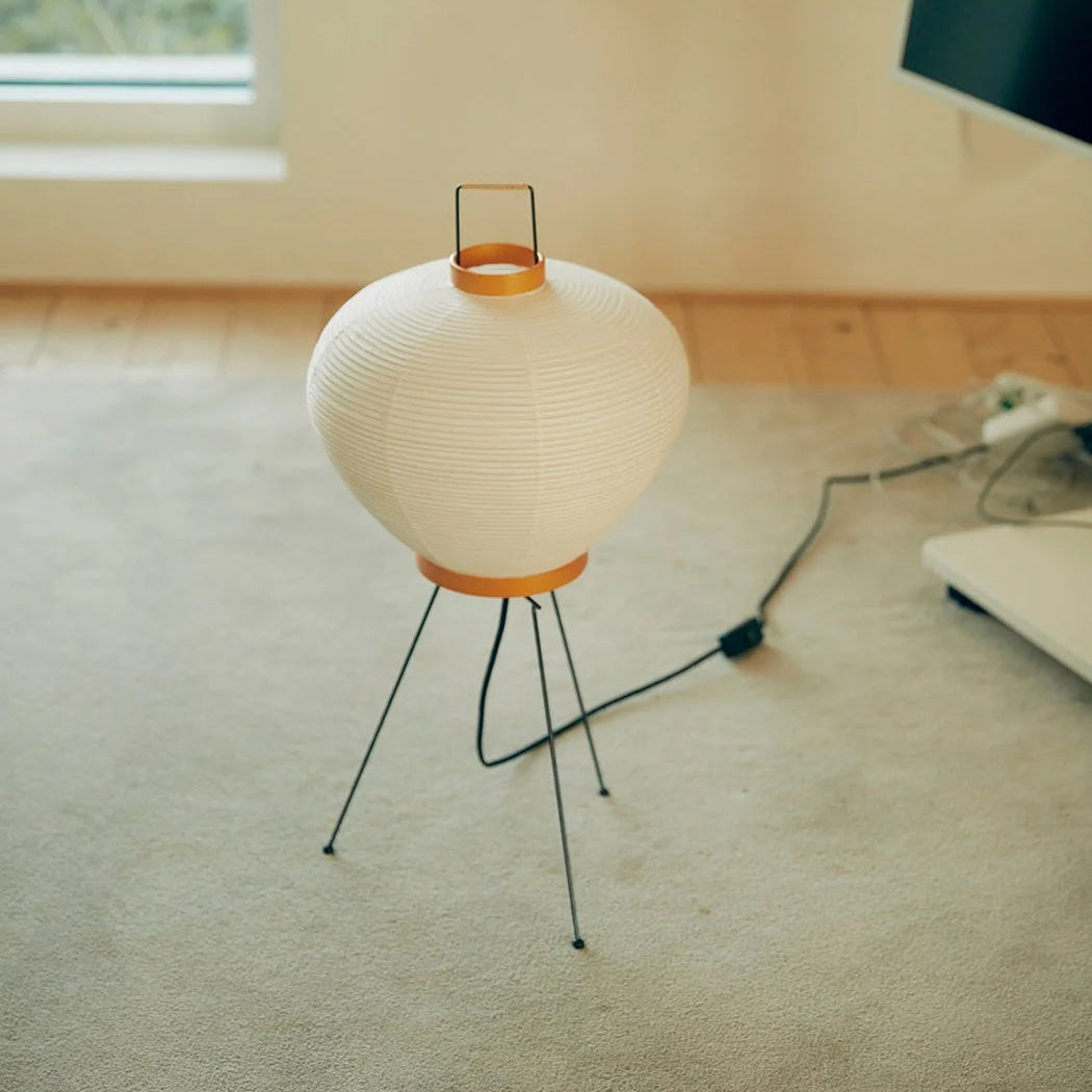 Side view of the Washi 3A Table Lamp showing its sleek metal base.