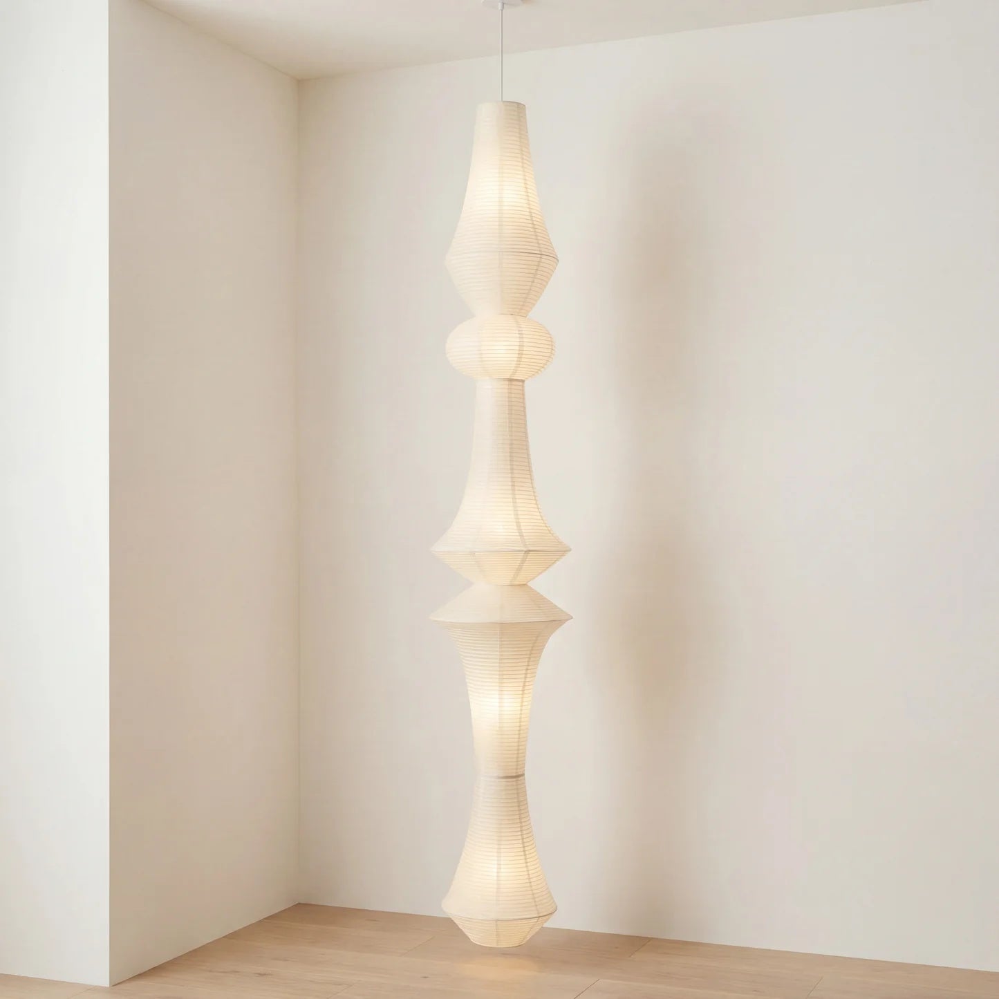 A collection of different sizes of the Washi Paper E Pendant Lamp.