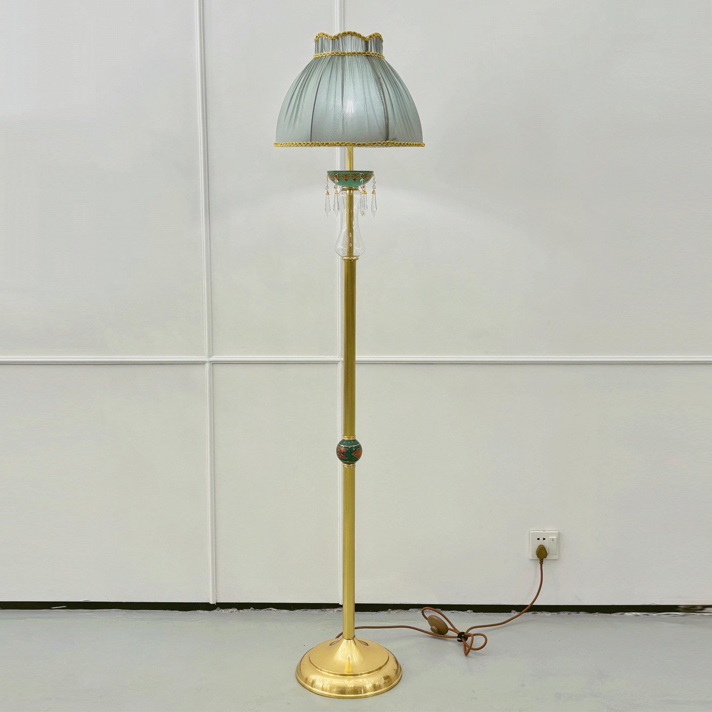 Side profile of the elegant Waterford Floor Lamp against a neutral background.