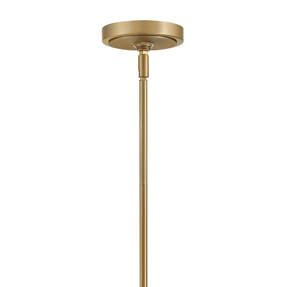Lifestyle image of the Welwyn Island Chandelier in a contemporary dining room setting.
