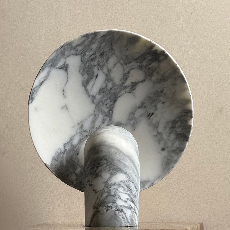 Black marble lamp, side view.