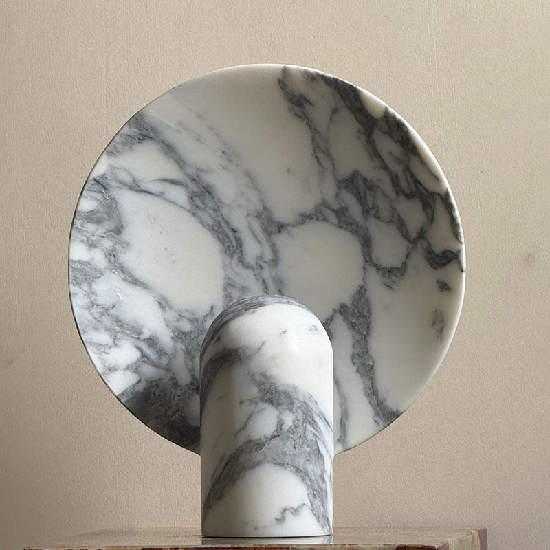 Grey marble lamp, front view, unlit.
