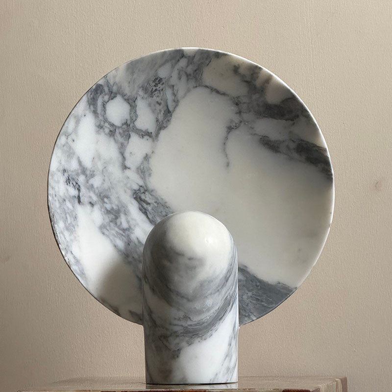 Purple onyx lamp showcasing its translucent quality.