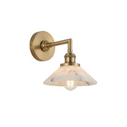Whizzer Alabaster Wall Sconce in brass finish against a neutral wall.