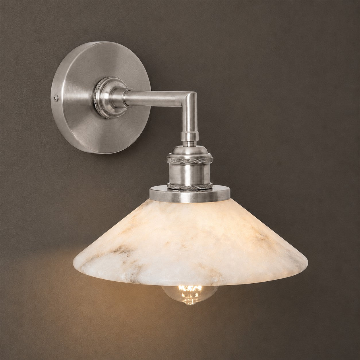 Full product view of the brass sconce.