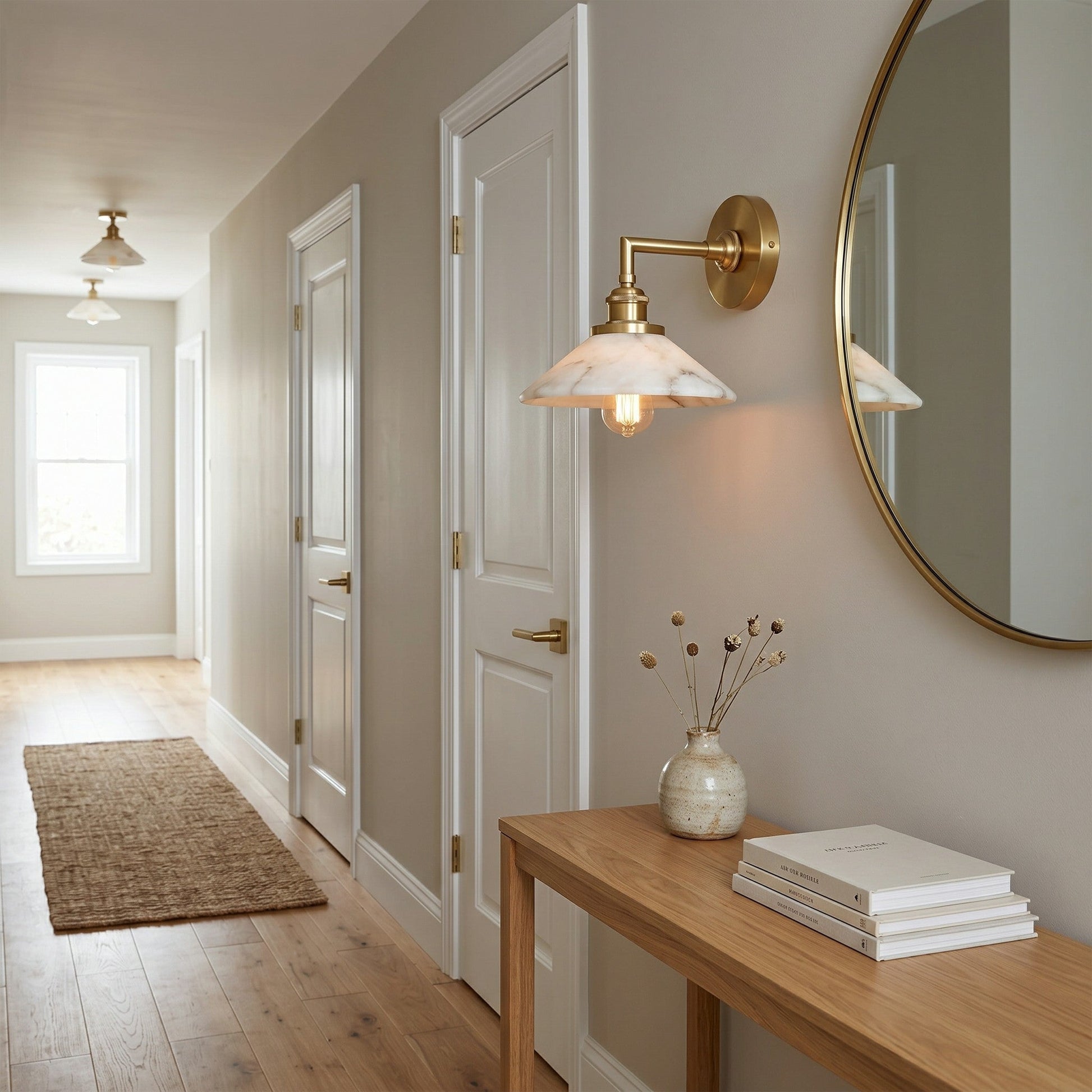 The wall sconce used as a bedside reading light.