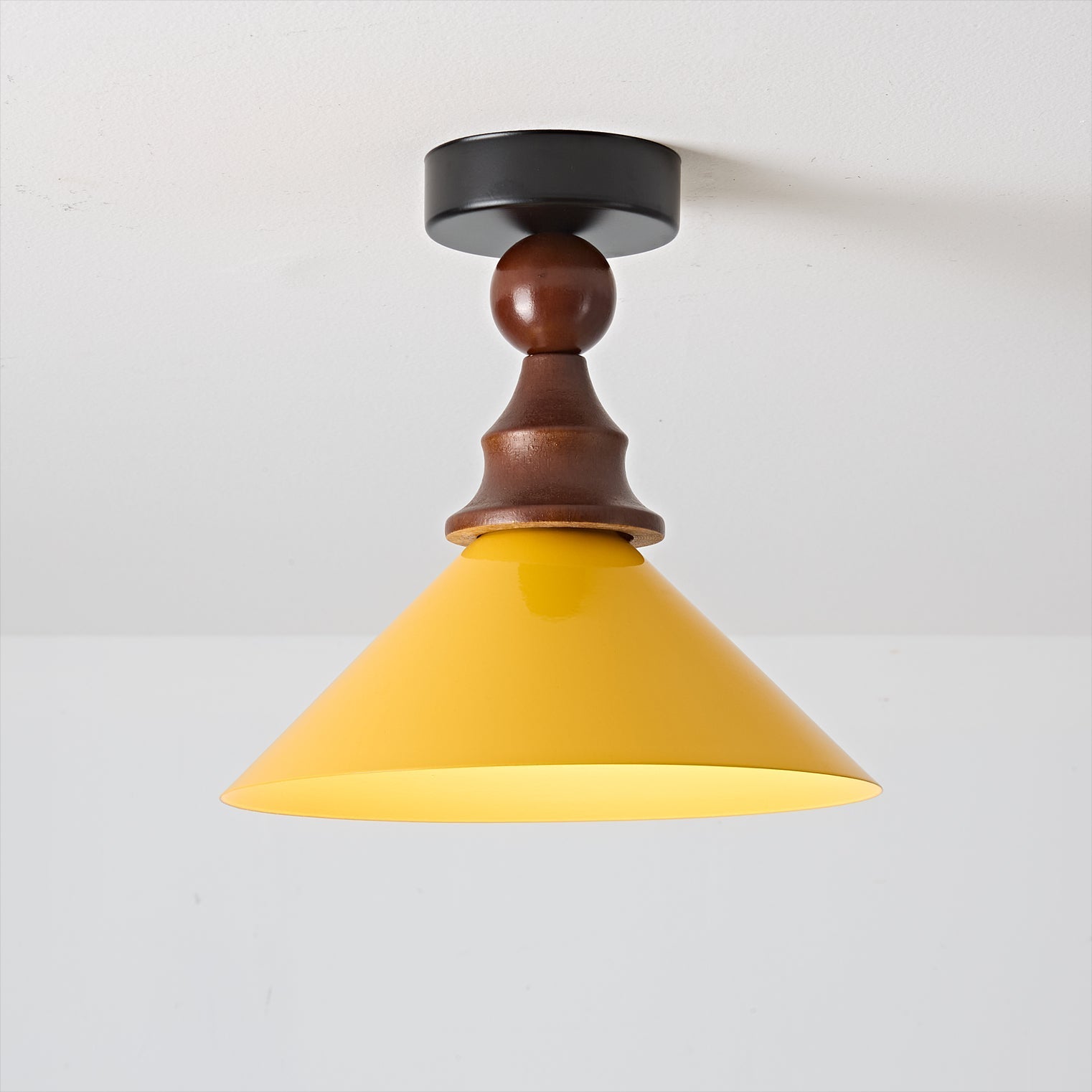 Side view of the Wilken Ceiling Lamp showing its dimensions.